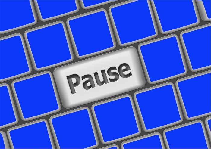 A view of a pause button in the keyboard with a white background