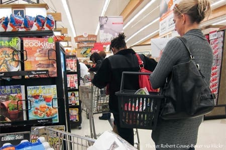 Woman shopping in grocery store.