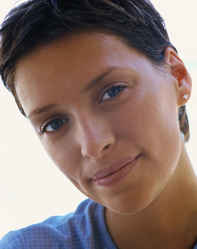 Close-up portrait of a woman with short hair.