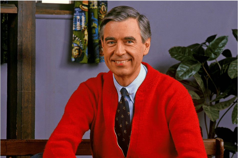 Fred Rogers in his iconic red cardigan.