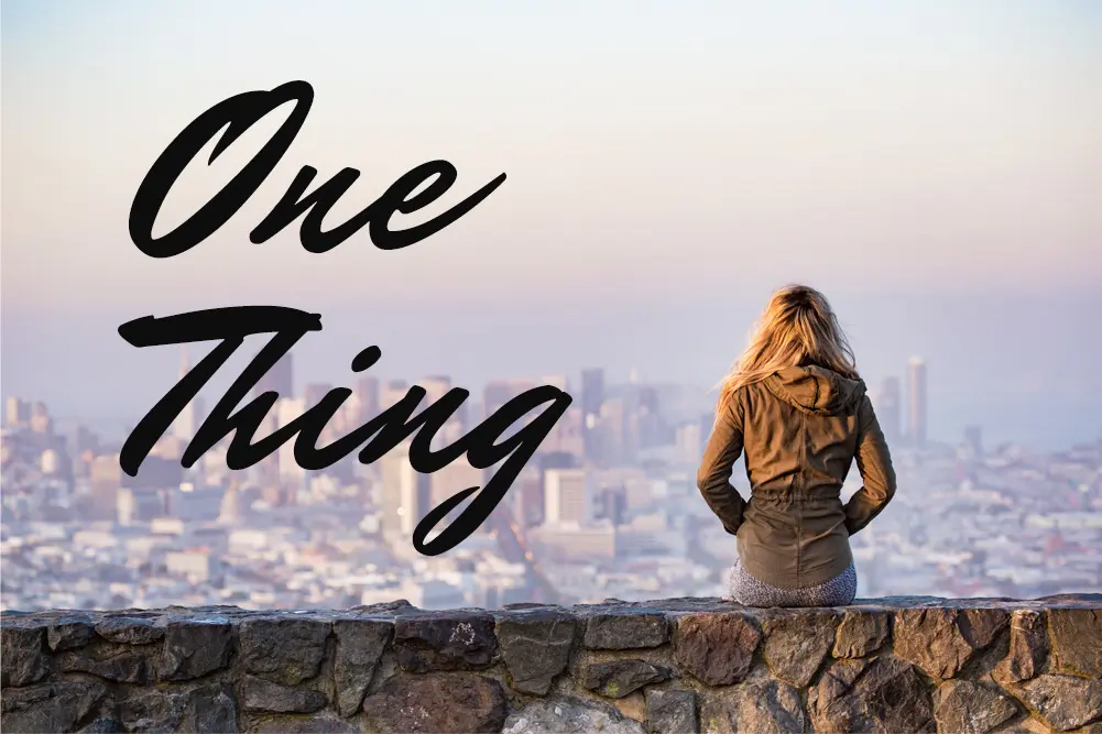 one-thing-woman-on-wall
